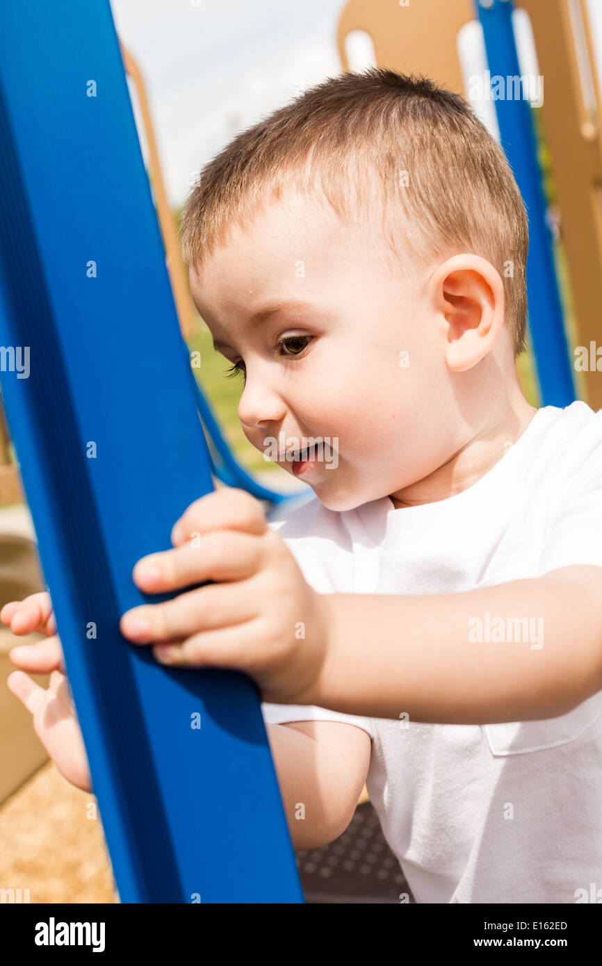 Toddle boy playing in the park Stock Photo Alamy