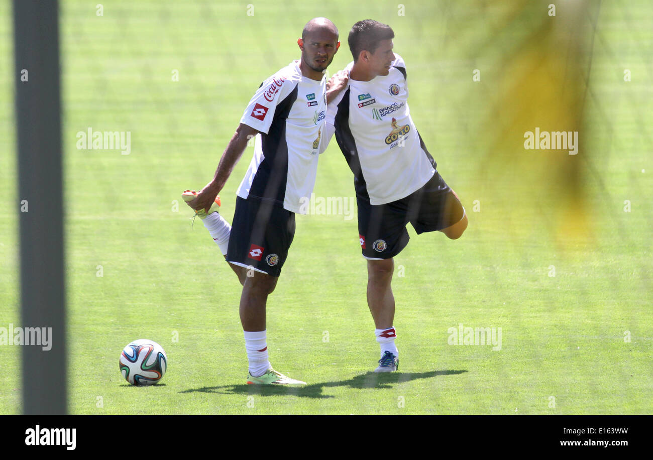 Santaana, Costa Rica. 23rd May, 2014. Heiner Mora (L) and Johnny Acosta of national team of Costa Rica participate in a training for World Cup in Santaana, Costa Rica, on May 23, 2014. © Kent Gilbert/Xinhua/Alamy Live News Stock Photo