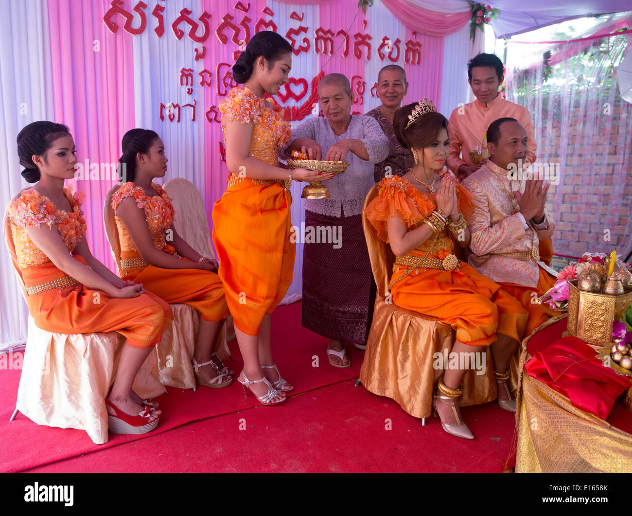 Grandparents symbolically trim the hair at Cambodian Wedding of Suon Kosal (groom) and Pao Sara (bride) Siem Reap, Cambodia Stock Photo