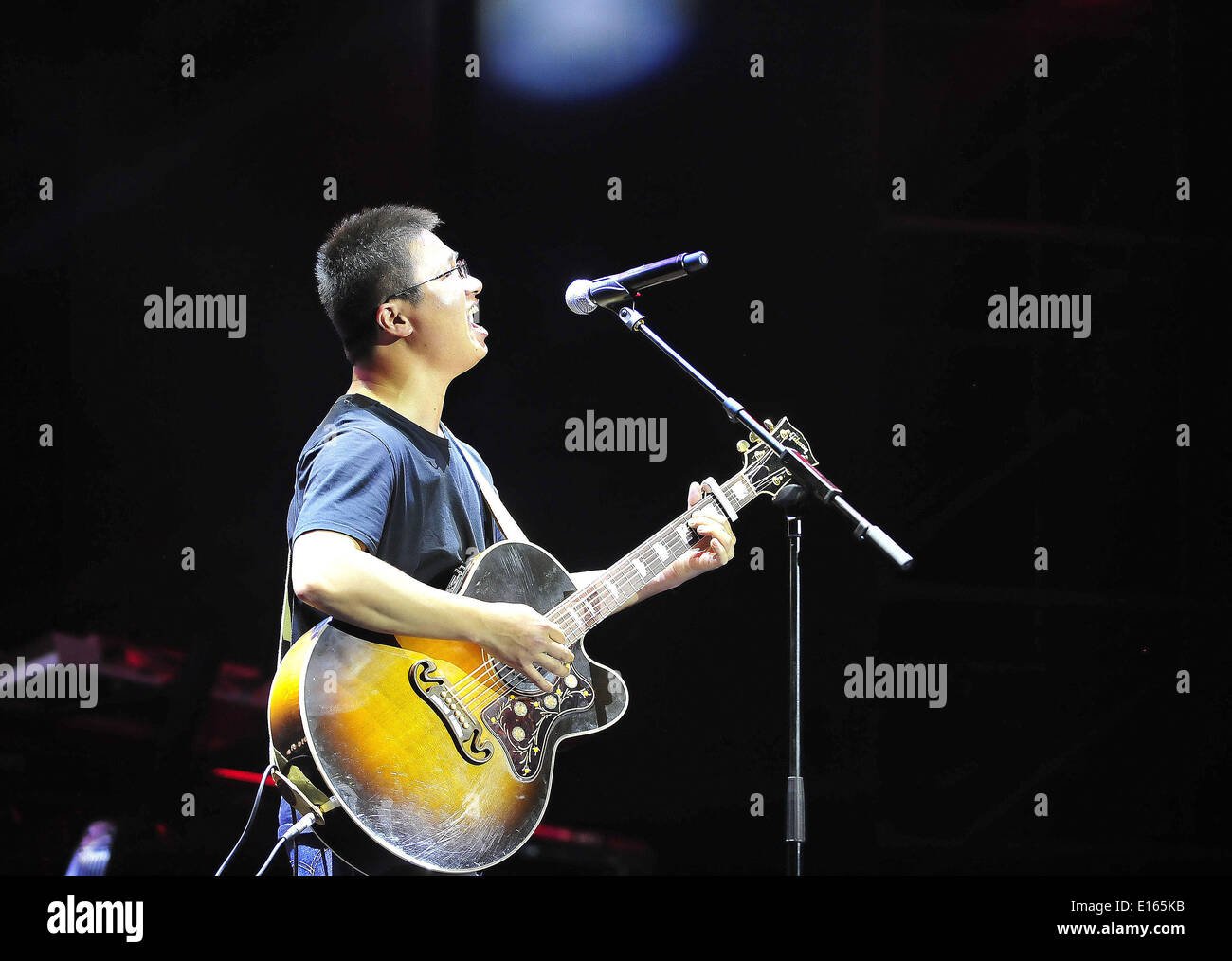 Beijing, China. 23rd May, 2014. Folk ballad singer Li Zhi performs