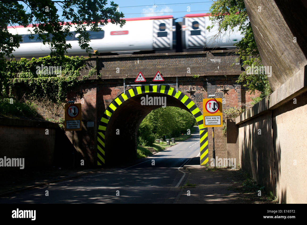 A Virgin Pendolino train on the West Coast Main Line, Long Buckby Wharf, Northamptonshire, England, UK Stock Photo