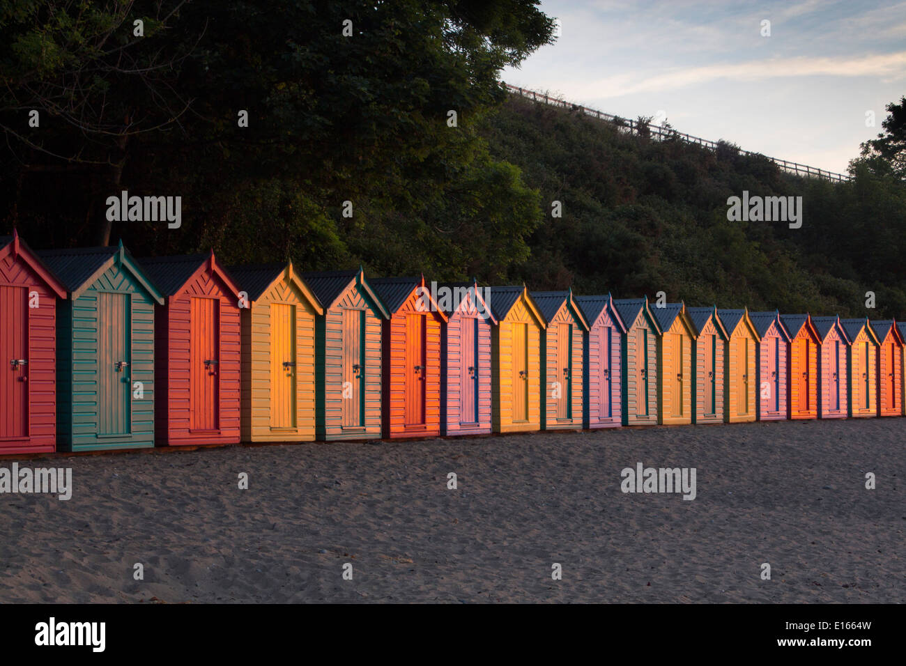 Llanbedrog Beach huts at dawn Llŷn Lleyn Peninsula Gwynedd North Wales UK Stock Photo