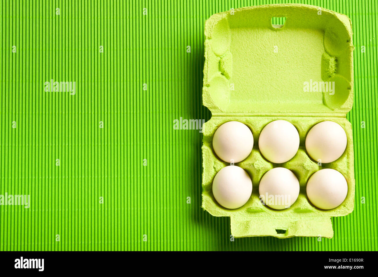 white organic eggs in a green carton Stock Photo Alamy