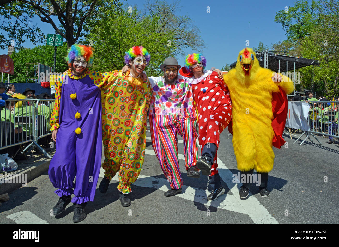 Religious Jewish men dressed as a clown at the Lag B'Omer parade in