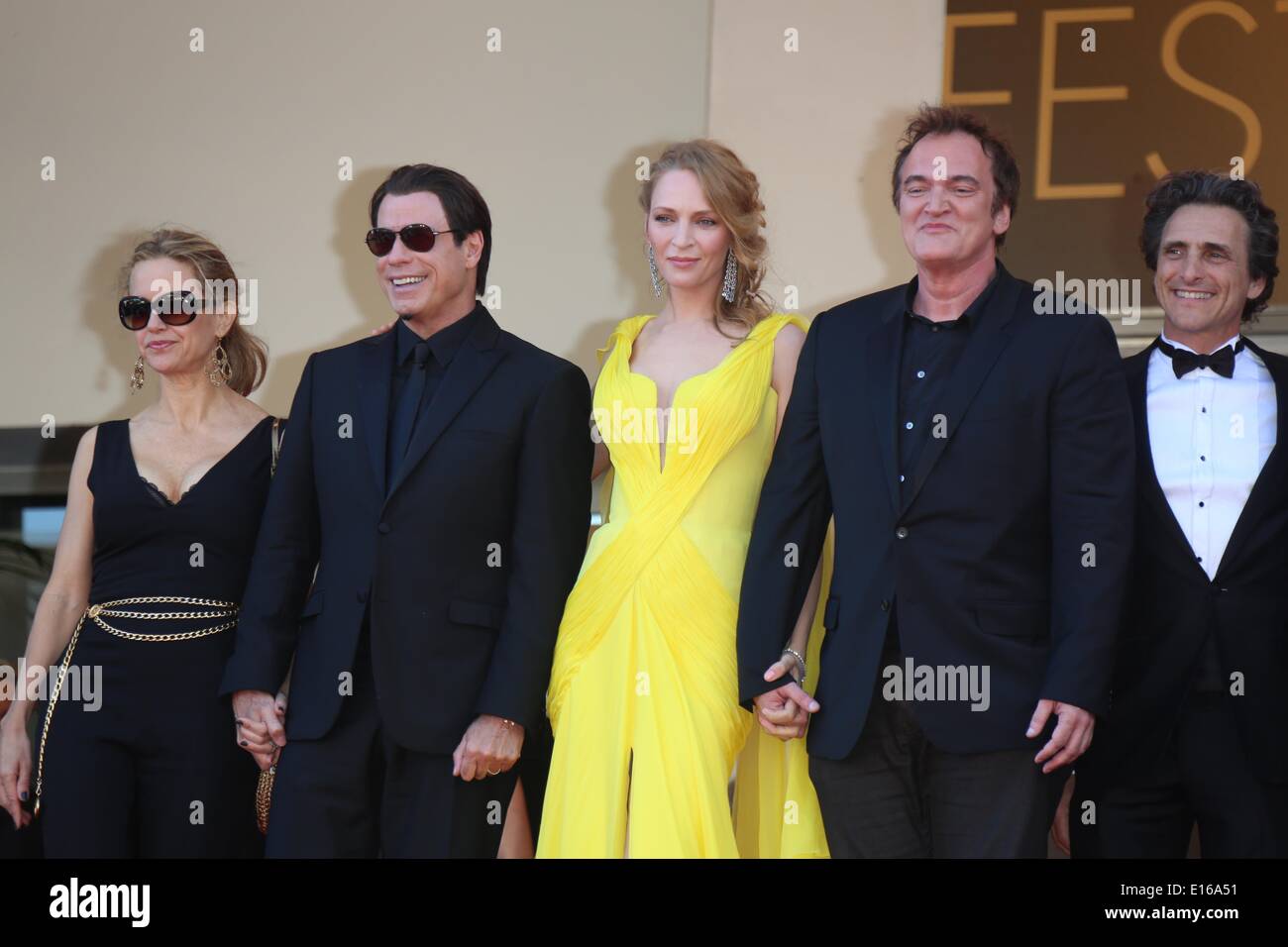 Cannes, France. 23rd May, 2014. US actors Kelly Preston (L-R), John Travolta, Uma Thurman, US director Quentin Tarantino and US producer Lawrence Bender attend the premiere of 'Sils Maria' during the 67th Cannes International Film Festival at Palais des Festivals in Cannes, France, on 23 May 2014. Photo: Hubert Boesl-NO WIRE SERVICE- Credit:  dpa picture alliance/Alamy Live News Stock Photo