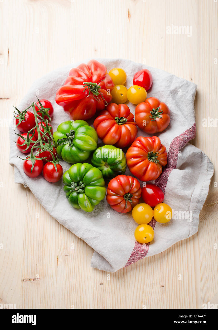 Fresh green and red tomatoes Stock Photo