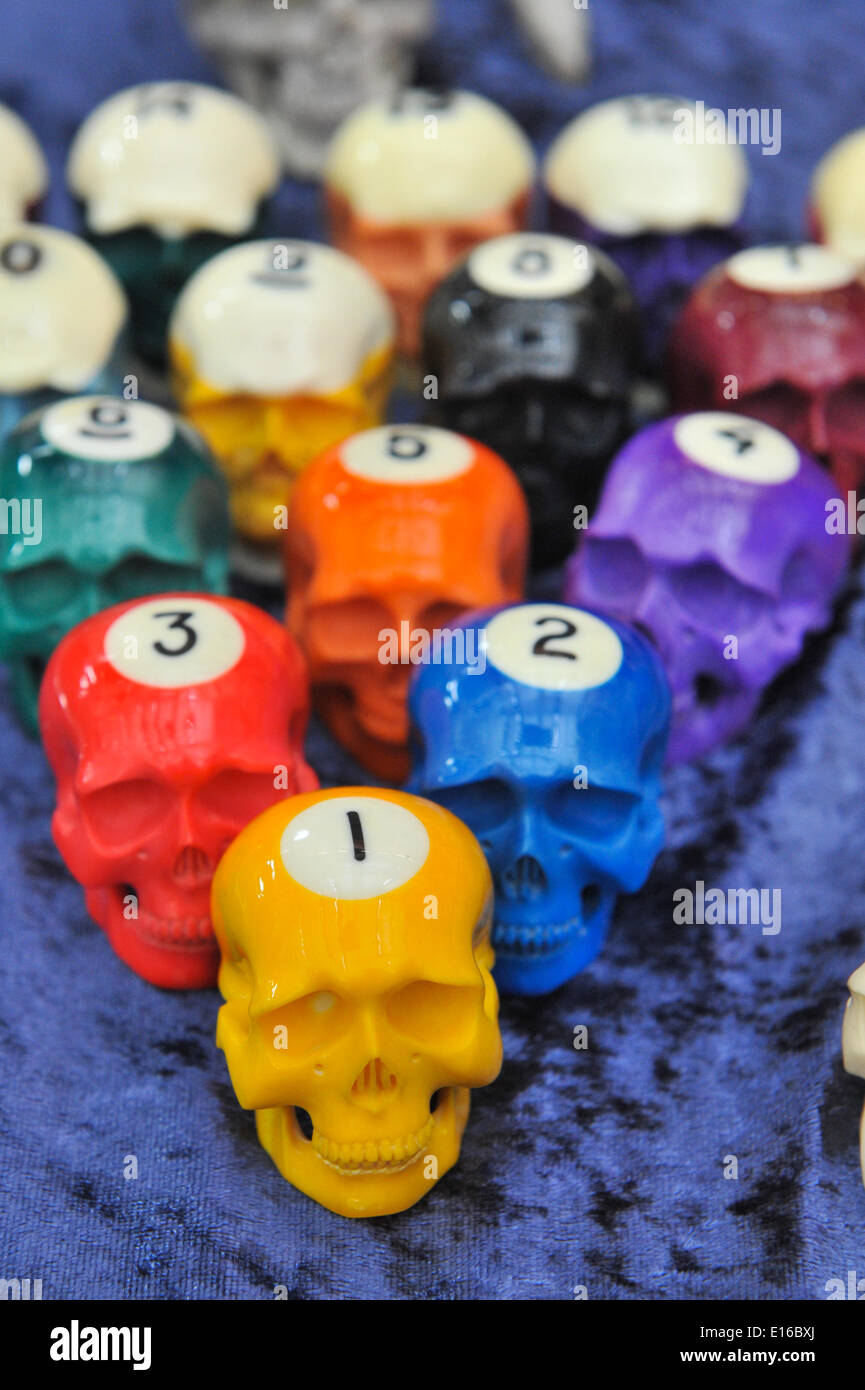 Alexandra Palace, London, UK. 24th May 2014. A set of skull pool balls on sale at a stall of curiosities. The show features tattooing,  stall selling clothing and accessories, wrestling and a fashion show Credit:  Matthew Chattle/Alamy Live News Stock Photo
