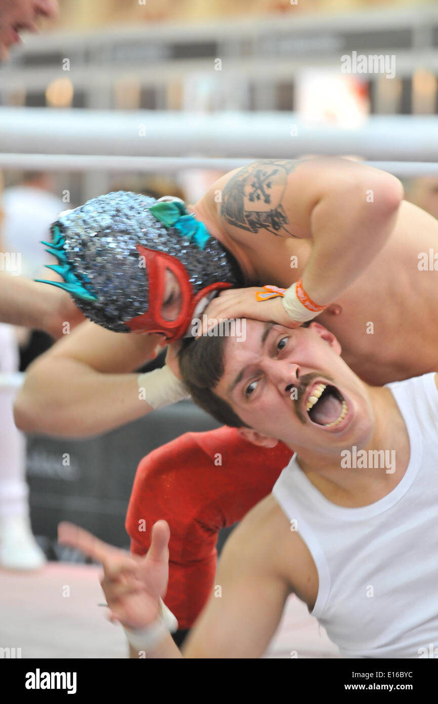Alexandra Palace, London, UK. 24th May 2014. The Lucha Britannia wrestlers perform at the Tattoo Show. The show features tattooing,  stall selling clothing and accessories, wrestling and a fashion show Credit:  Matthew Chattle/Alamy Live News Stock Photo