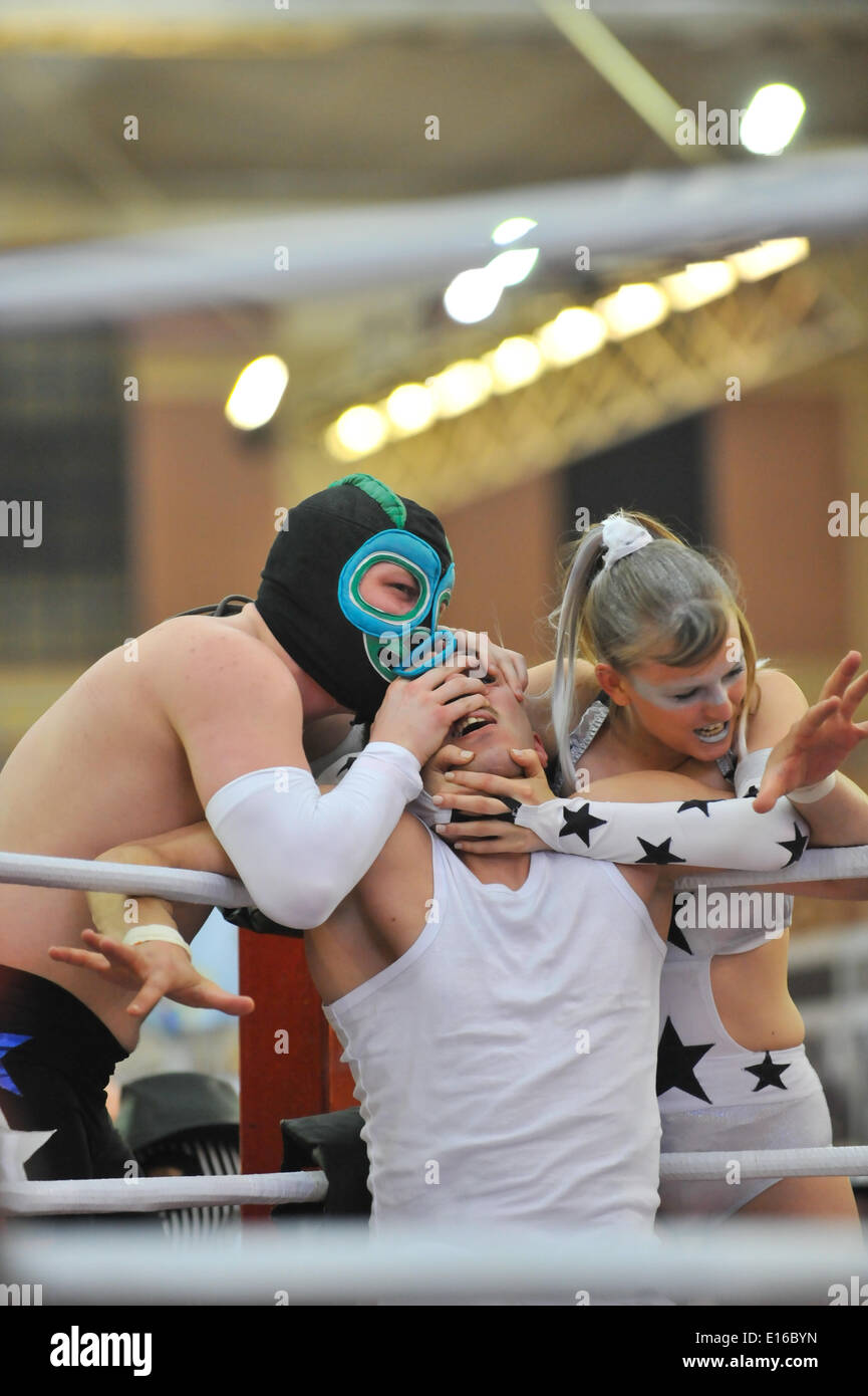Alexandra Palace, London, UK. 24th May 2014. The Lucha Britannia wrestlers perform at the Tattoo Show. The show features tattooing,  stall selling clothing and accessories, wrestling and a fashion show Credit:  Matthew Chattle/Alamy Live News Stock Photo