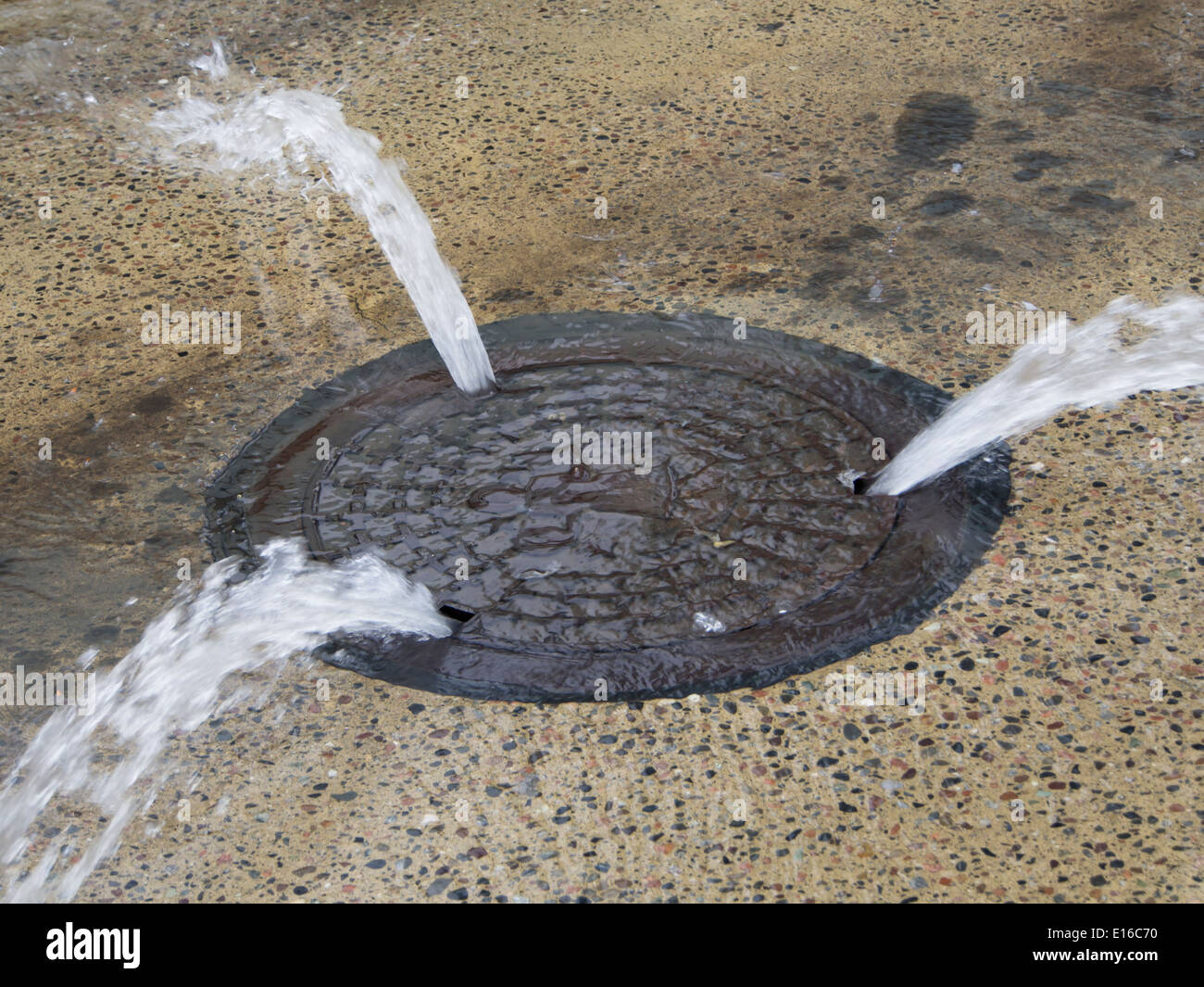 Leaking water mains in Oslo Norway changing the manhole cover into a