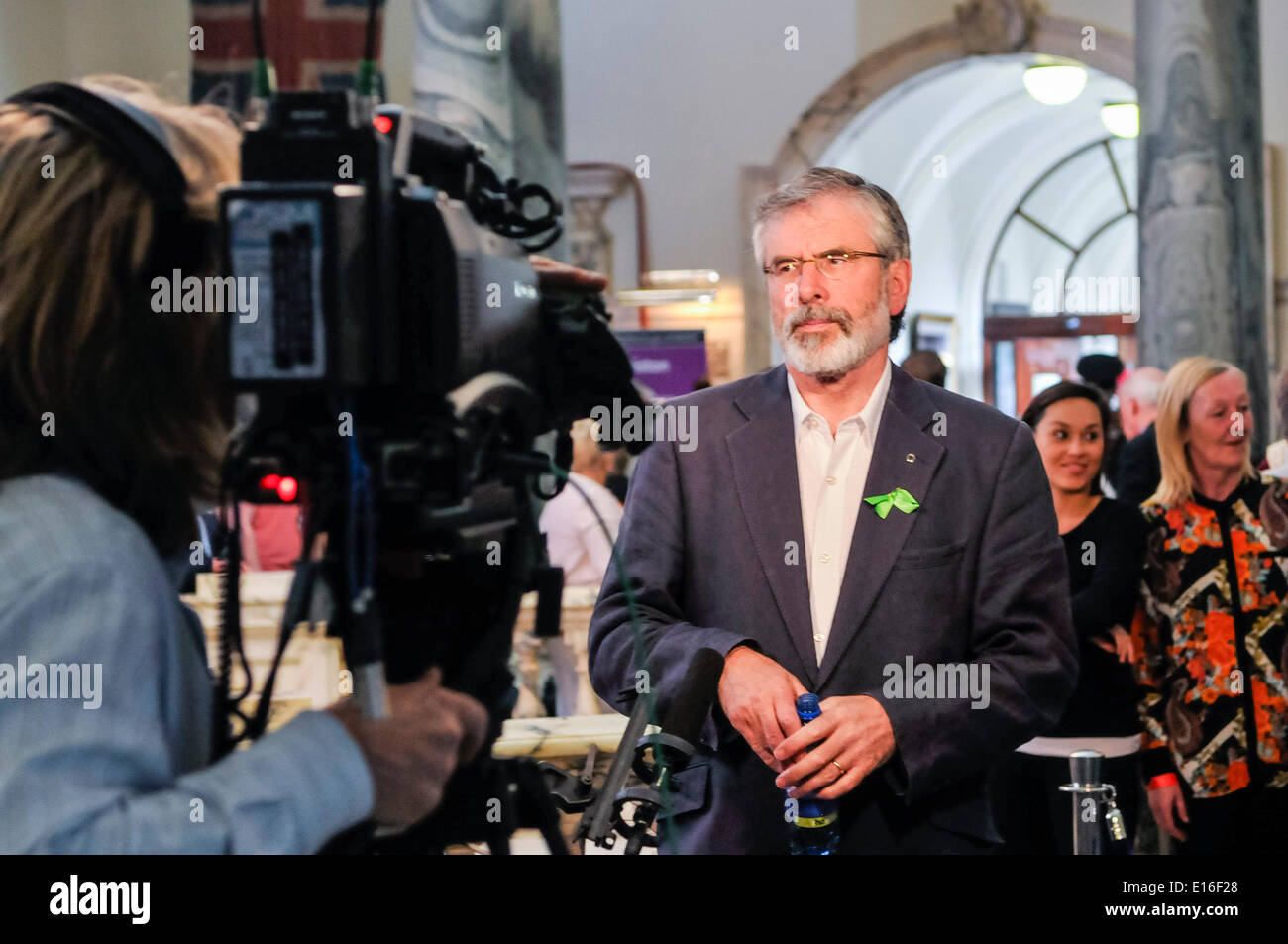 Belfast, Northern Ireland. 24 May 2014 - Sinn Fein President, Gerry Adams (TD for Louth), is interviewed by UTV at Belfast City Hall during the count of the Local Government vote for Belfast City Council. Credit:  Stephen Barnes/Alamy Live News Stock Photo