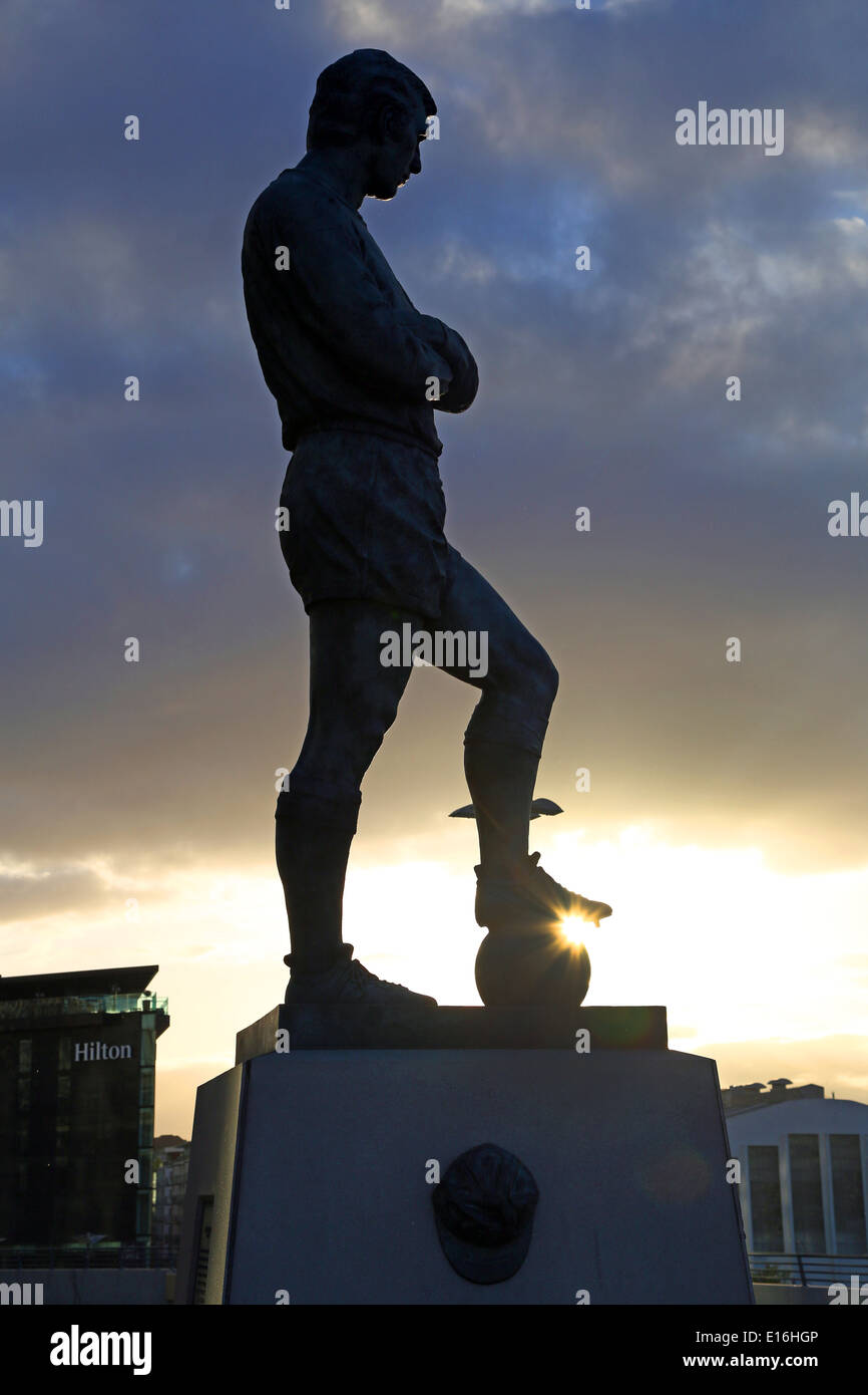 Silhouette of the statue of Bobby Moore at Wembley Stadium, London, England Stock Photo