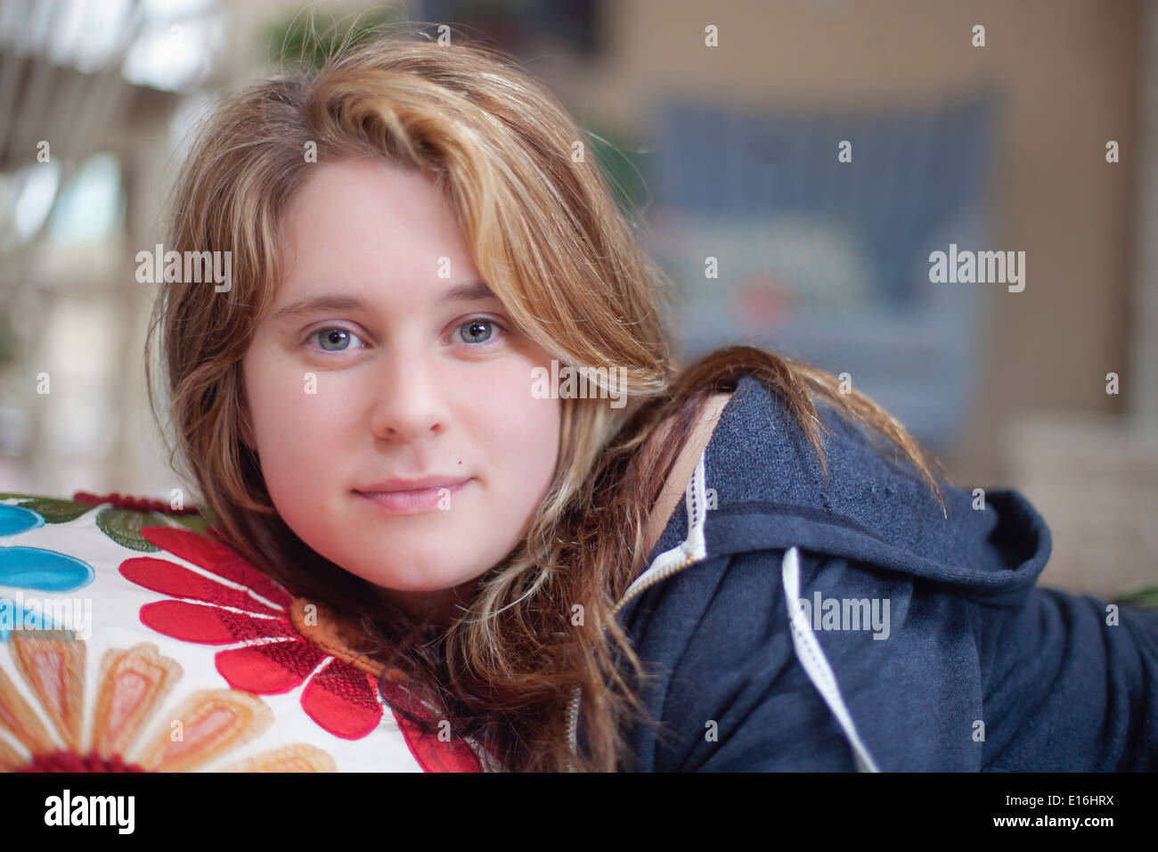 Half length portrait of teenage girl at home Stock Photo