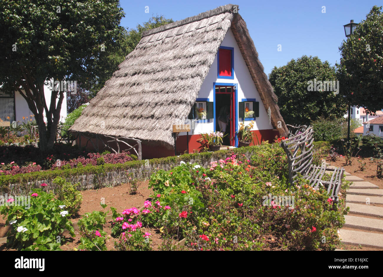 Palheiro thatched house and flowers Santana Madeira Stock Photo