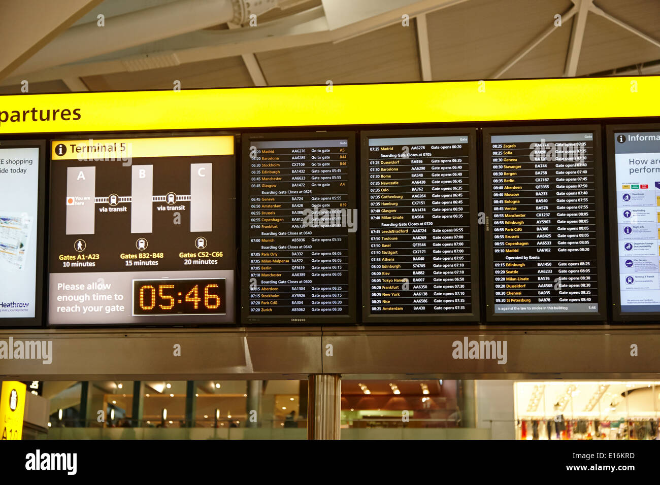 flight information boards London Heathrow Airport Terminal 5 early in the morning UK Stock Photo