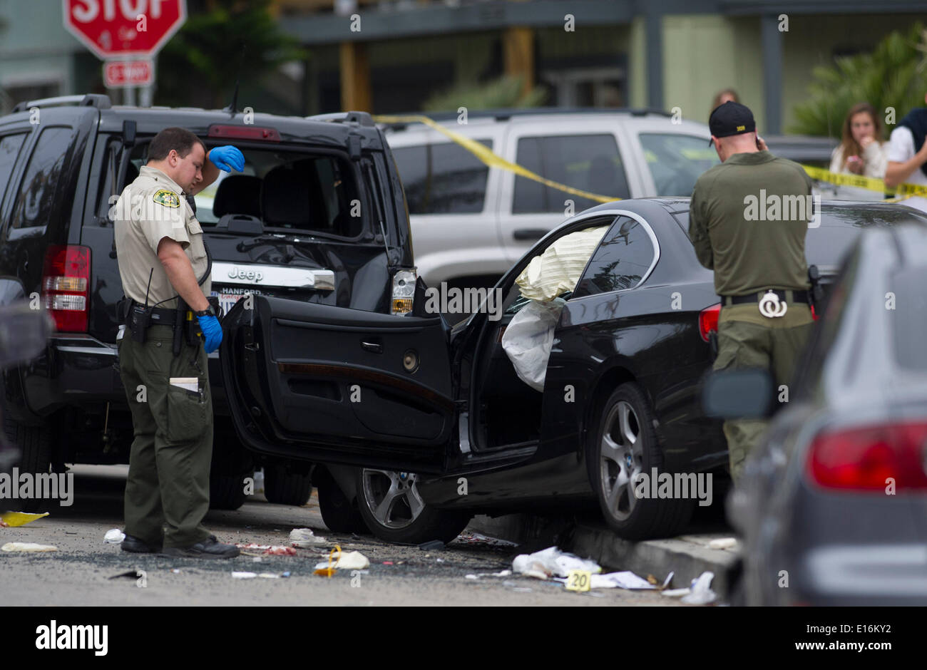 Santa Barbara, Southern California of the USA. 24th May, 2014. Policemen investigate the scene of shooting in Santa Barbara County, Southern California of the United States, May 24, 2014. Drive-by shootings in Southern California on Friday night left seven dead and seven wounded, a rampage that authorities believe to be 'premeditated mass murder', Santa Barbara County Sheriff Bill Brown said during a Saturday morning news conference. Credit:  Yang Lei/Xinhua/Alamy Live News Stock Photo