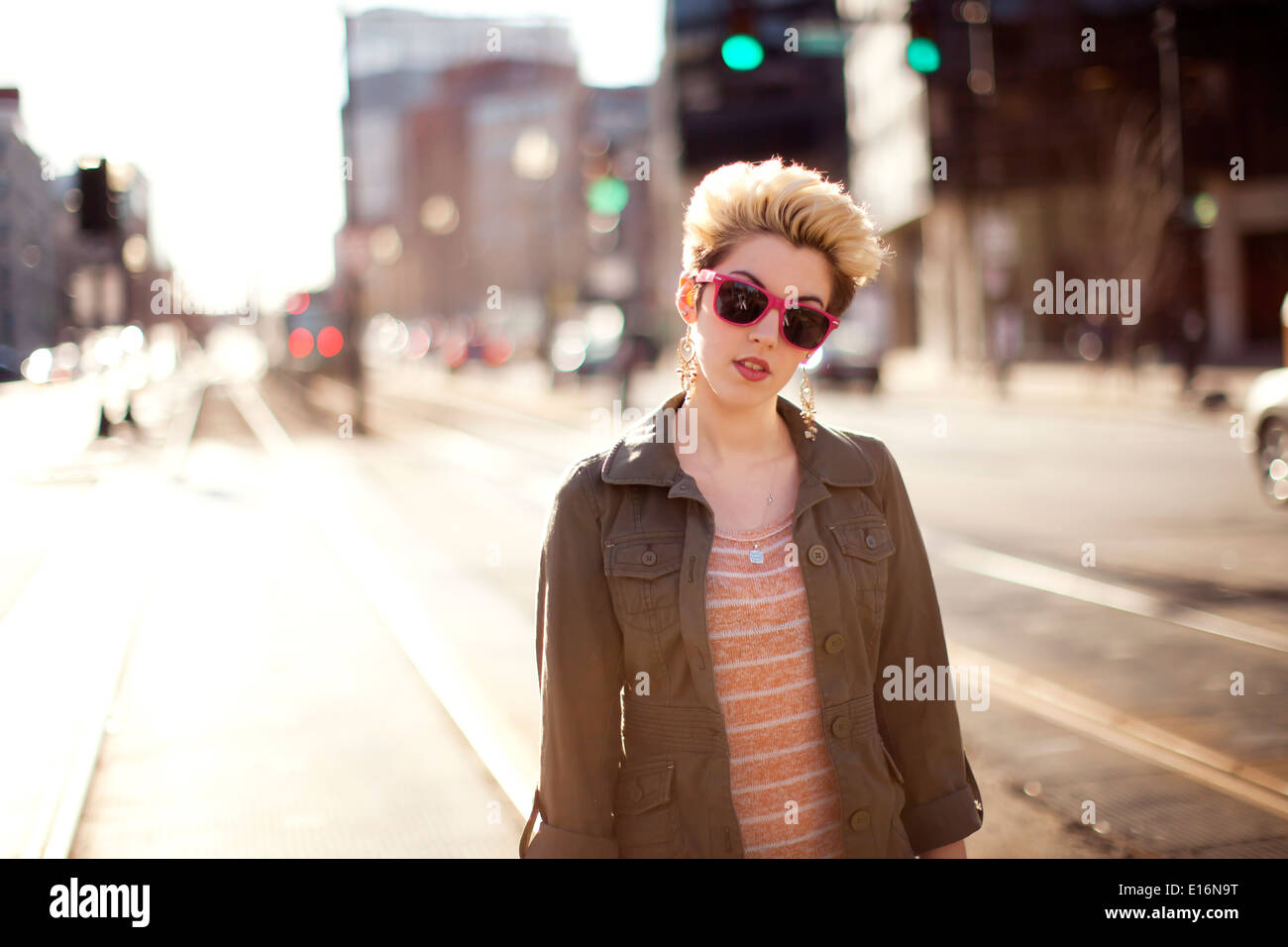 Half-length portrait of young woman in city, Boston, Massachusetts, USA Stock Photo