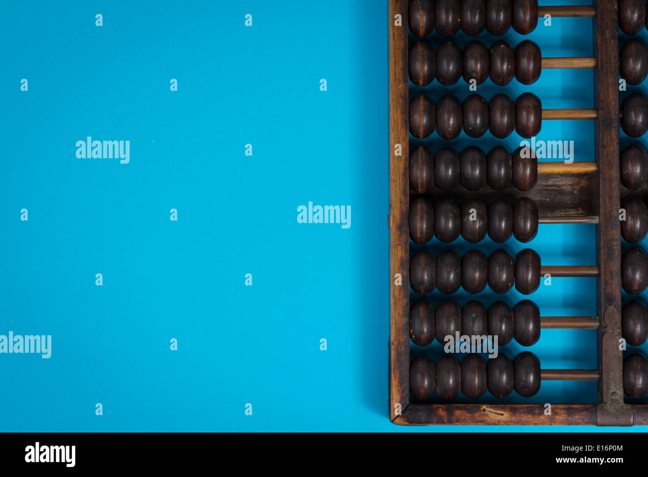 vintage abacus on blue background Stock Photo