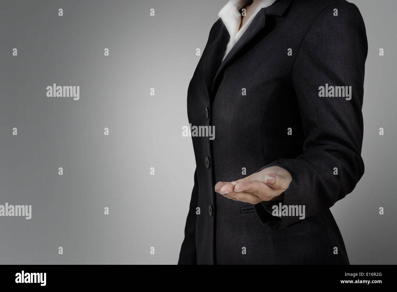 Open hand of business woman Stock Photo