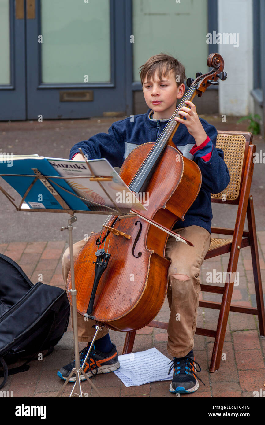 Child Busker, High Street, Lewes, Sussex, England Stock Photo
