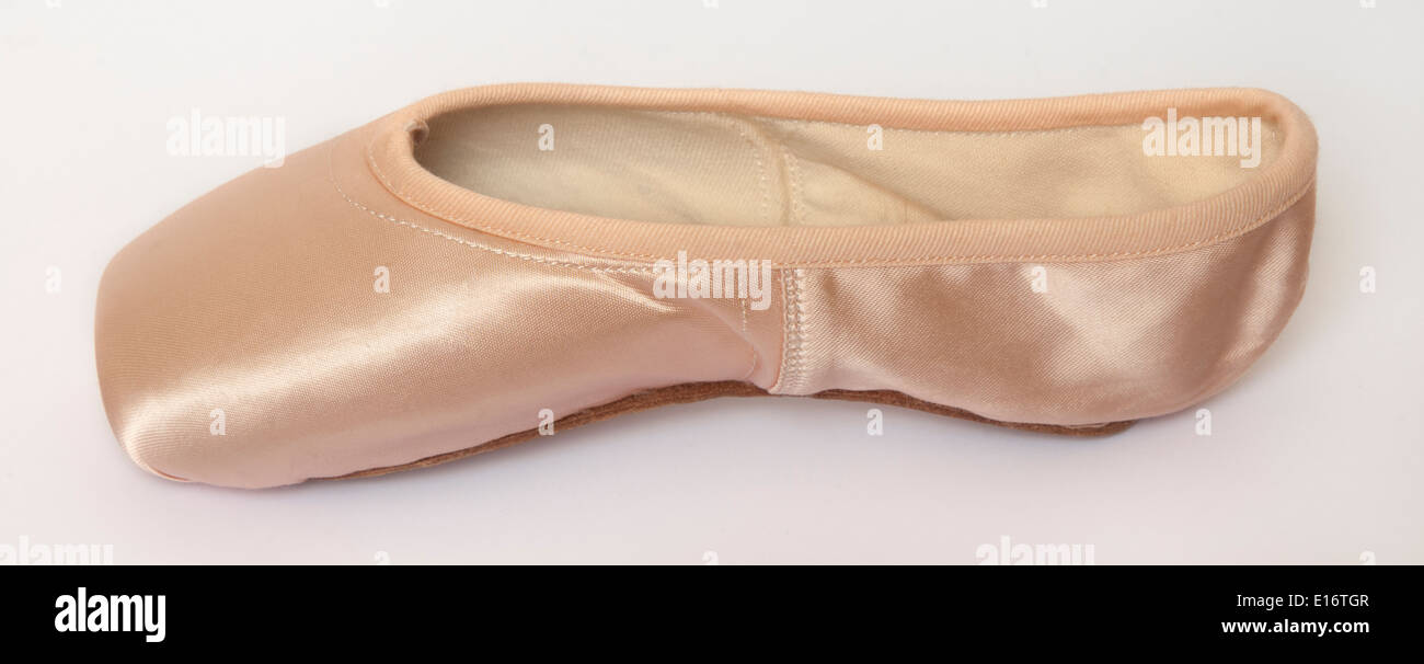 single pointe shoe without ribbons on white background Stock Photo Alamy
