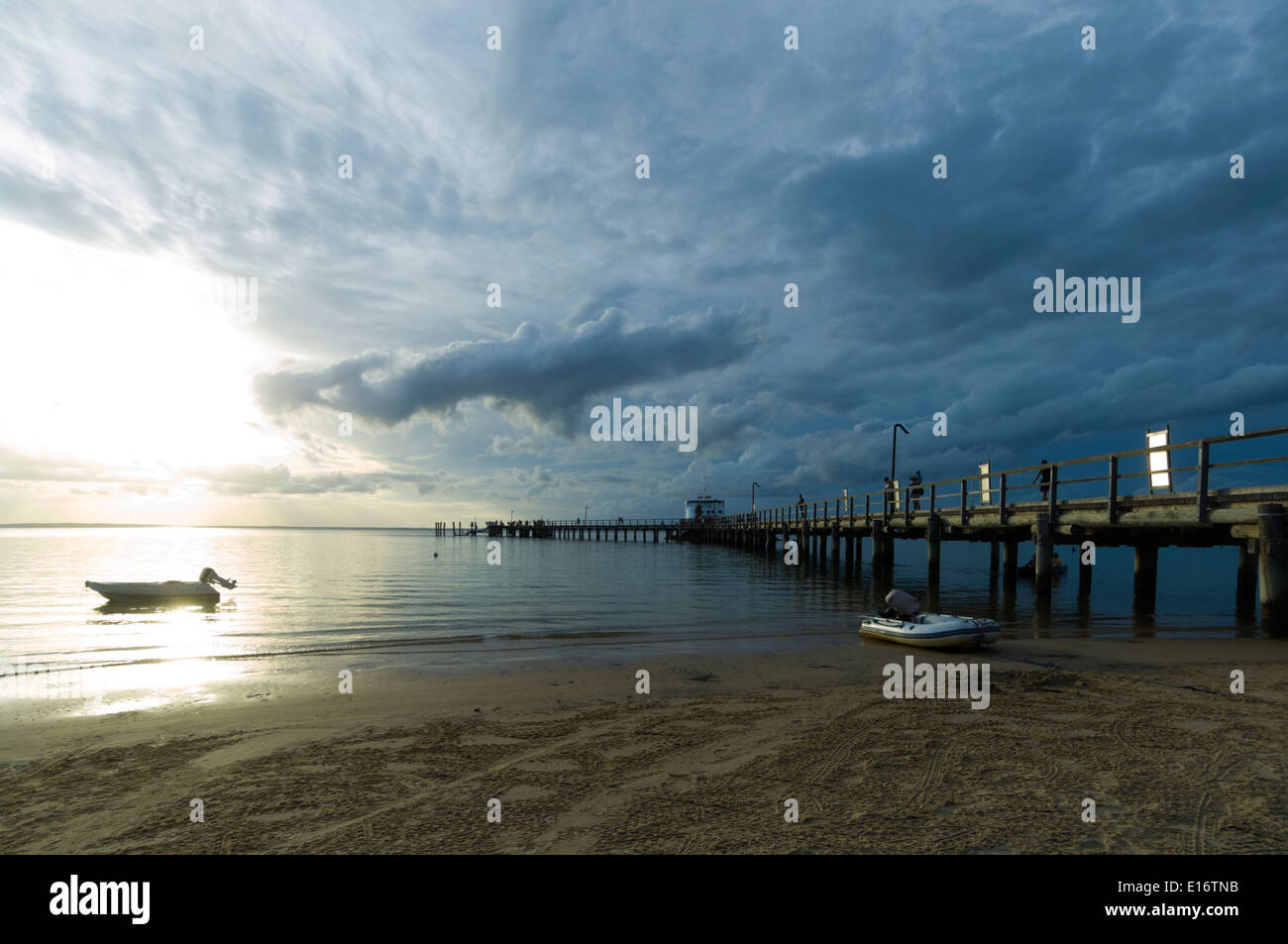 Sunset and threatening Skies, Kingfisher Bay Resort Jetty, Fraser Island, Queensland, QLD, Australia Stock Photo