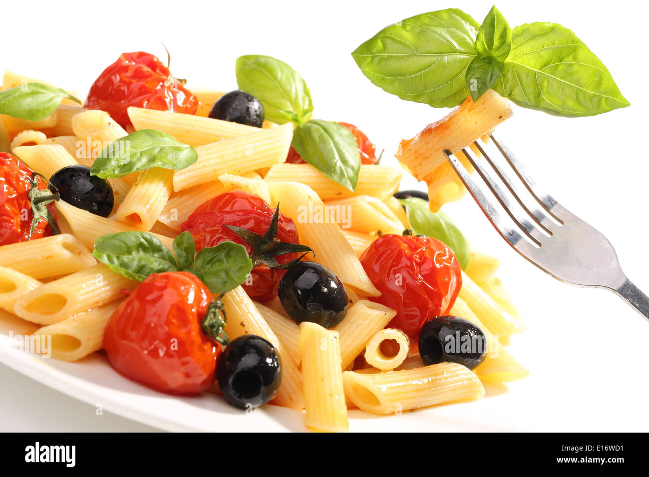 Pasta with cherry tomatoes and olives Stock Photo