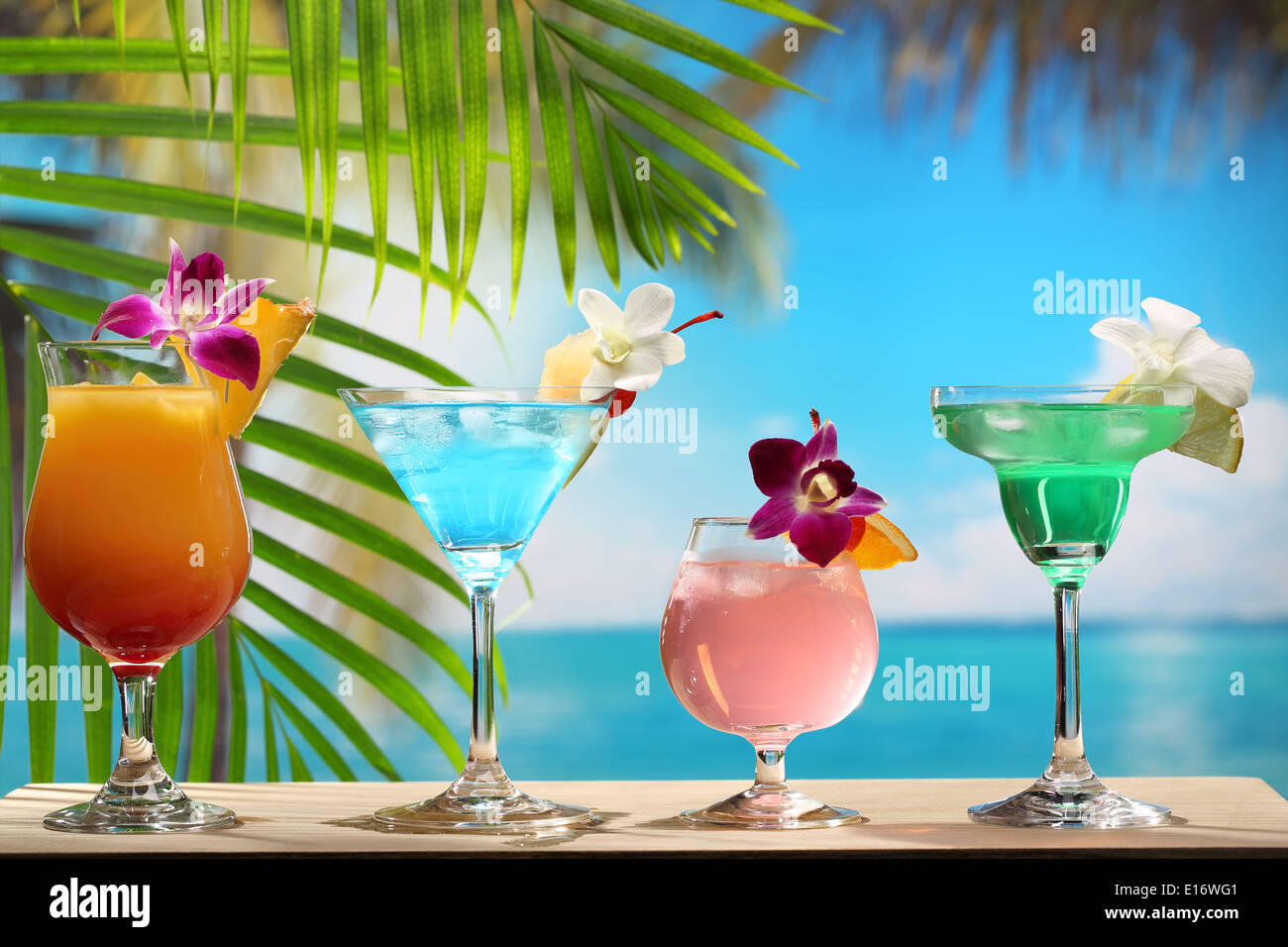 Refreshing cocktail on beach table. Stock Photo