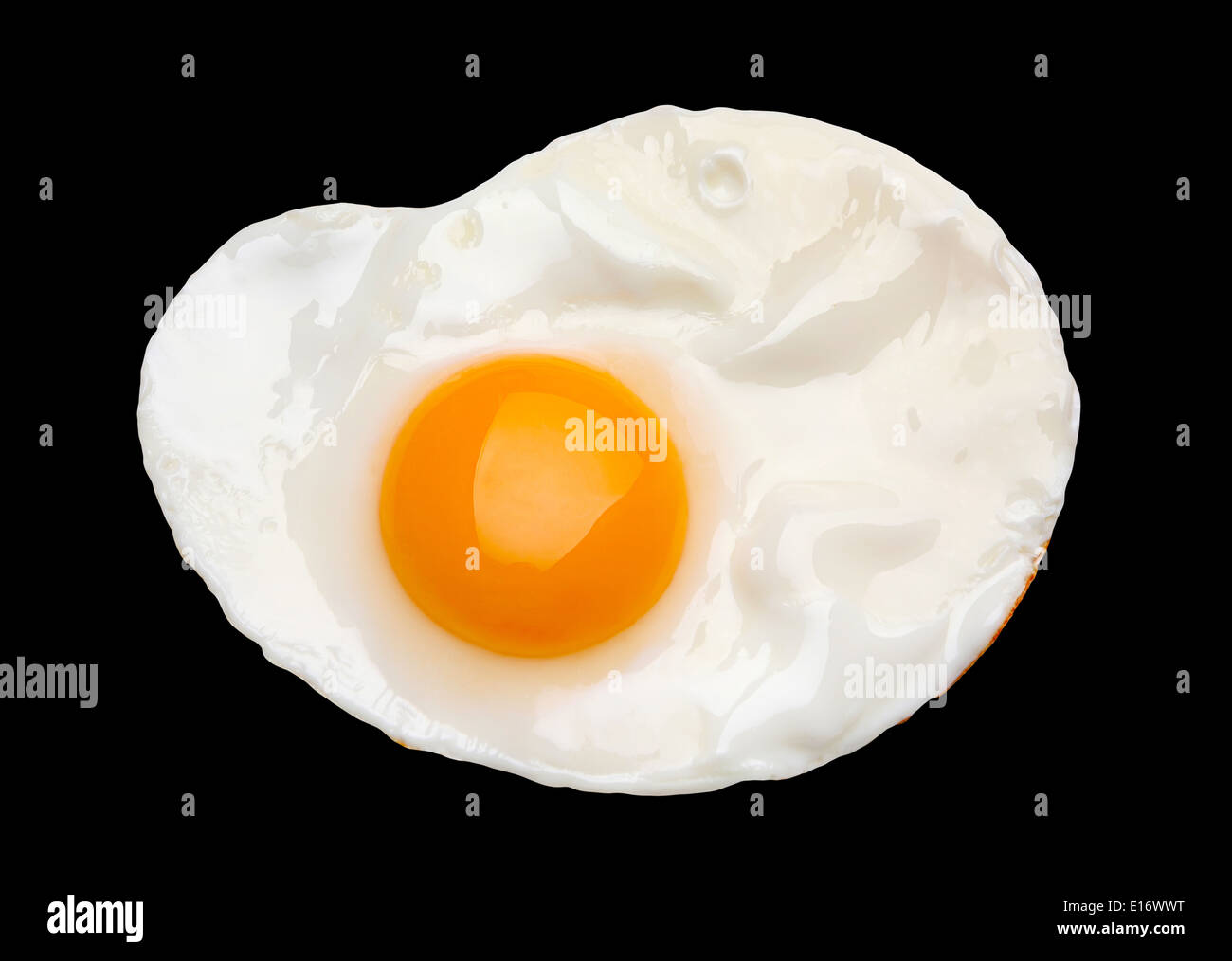 Fried egg isolated on black background Stock Photo