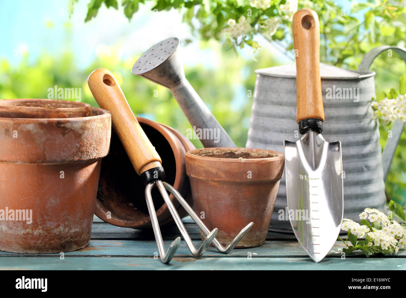 Outdoor gardening tools on table Stock Photo
