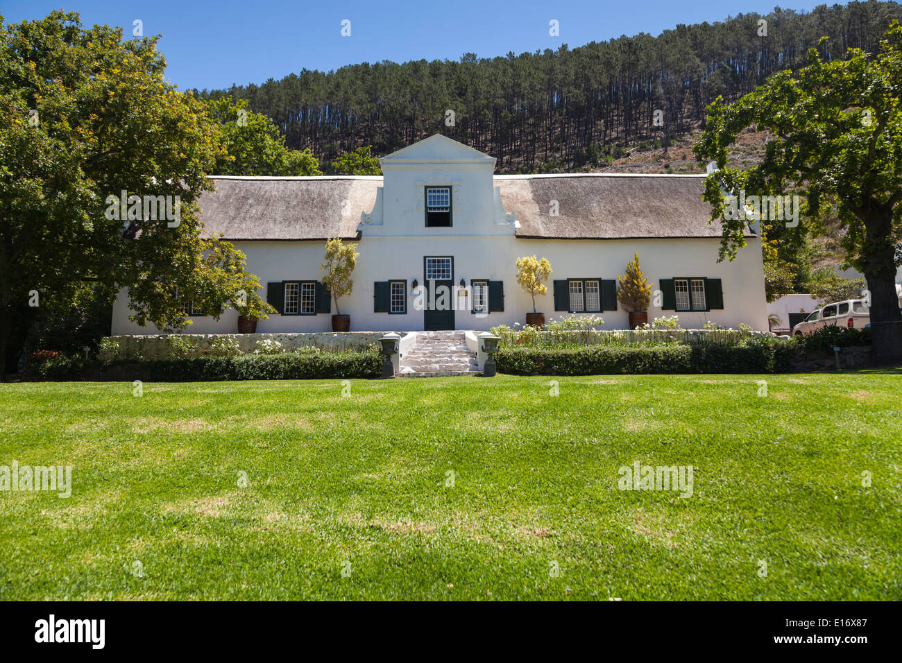 Cape Dutch manor house at Rickety Bridge wine estate, Franschhoek, Cape Winelands, South Africa Stock Photo