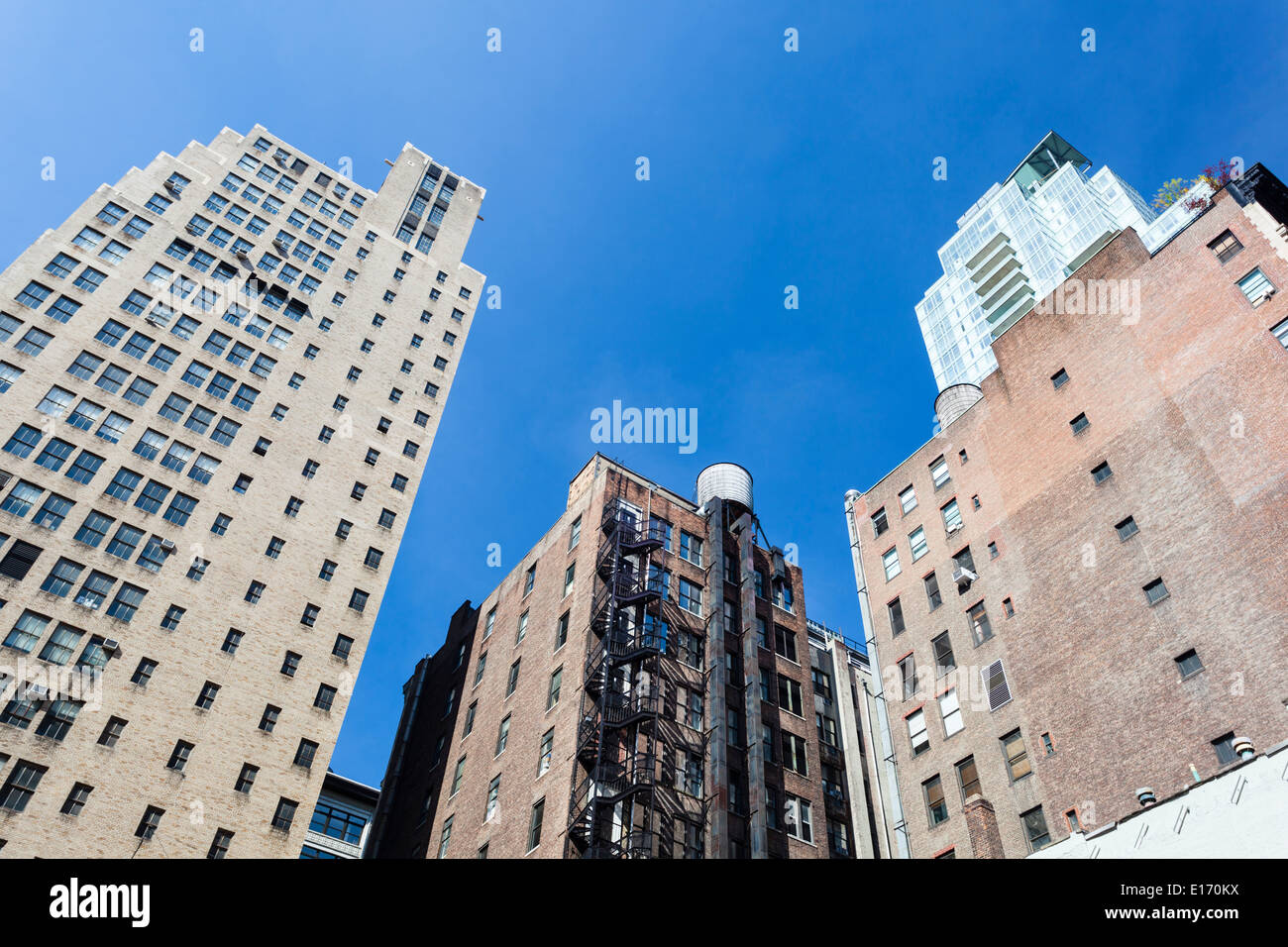 Old skyscrapers in New York with deep blue sky Stock Photo