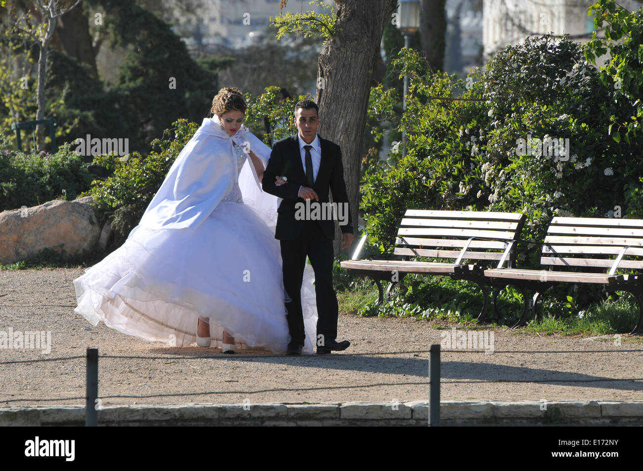 Arab Bride and groom having their wedding pictures taken at the Wohl Rose Park of Jerusalem Stock Photo