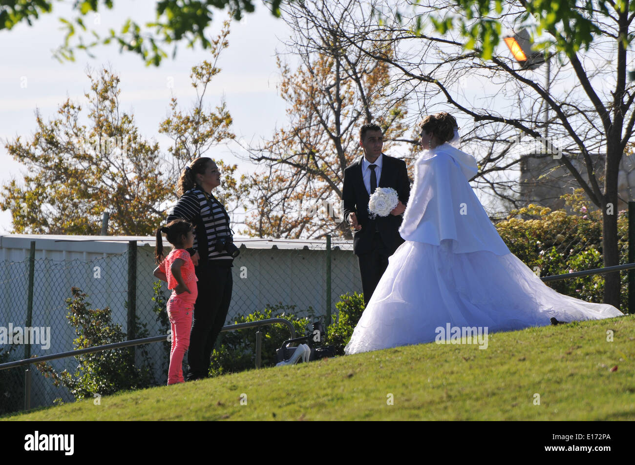 Arab Bride and groom having their wedding pictures taken at the Wohl Rose Park of Jerusalem Stock Photo