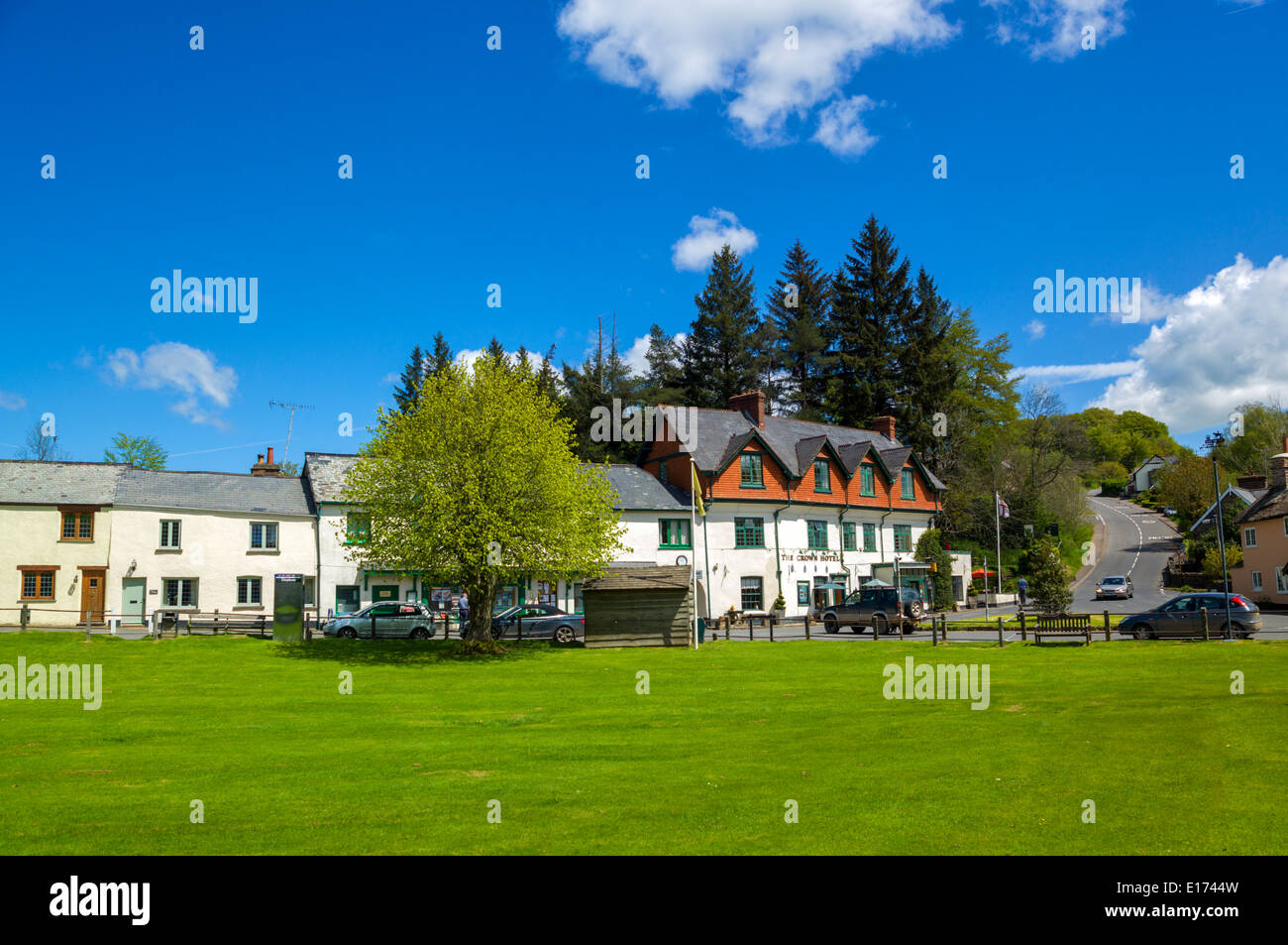 The Crown Hotel and village green at Exford in the the centre of Exmoor, Somerset Stock Photo