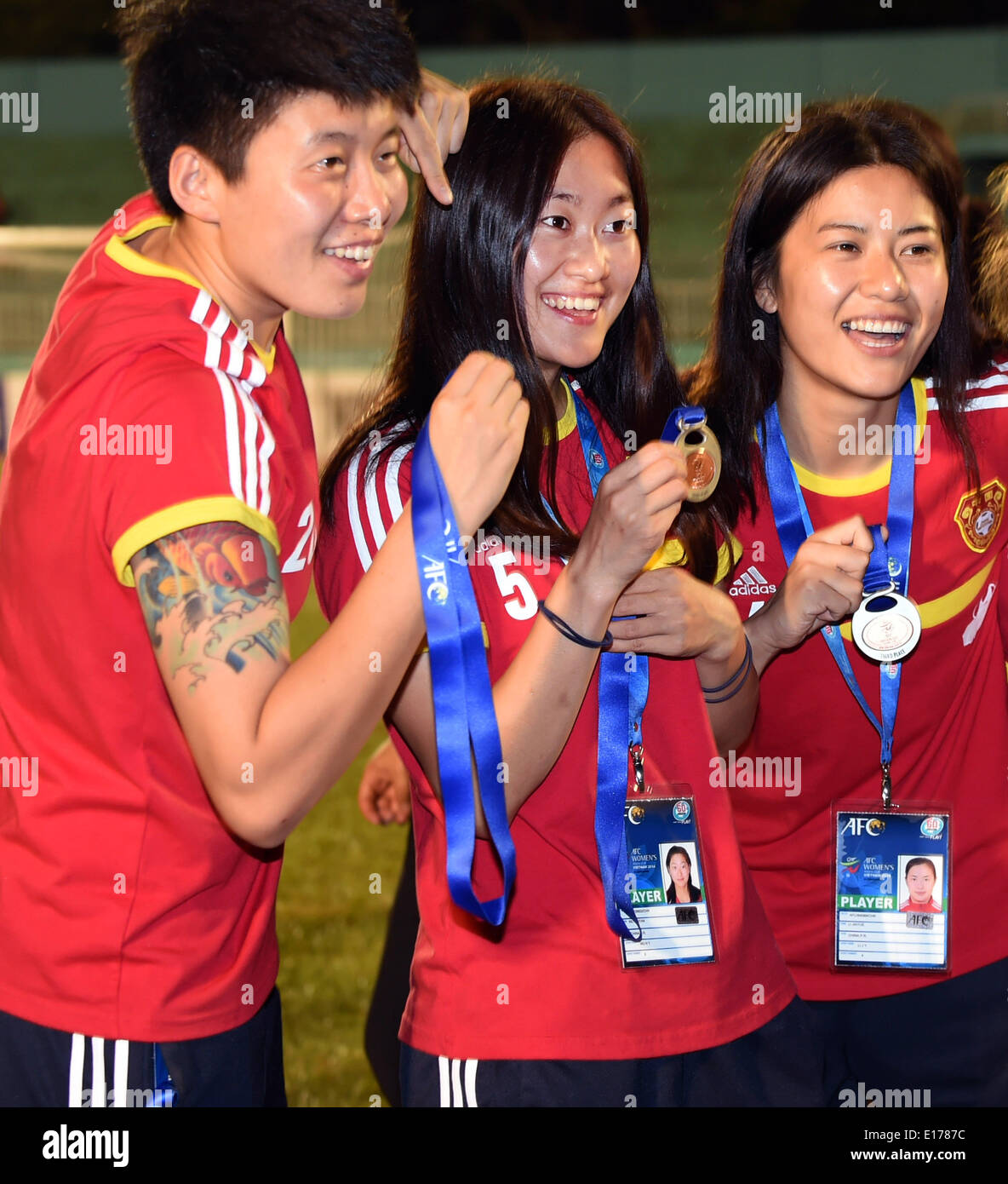 Ho Chi Minh City, Vietnam. 25th May, 2014. Team China pose on the podium during the award ceremony at the 2014 Asian Football Confederation (AFC) Women's Asian Cup at Thong Nhat Stadium in Ho Chi Minh City, Vietnam, May 25, 2014. China defeat South Korea 2-1 to win the third place of the event. © Cheong Kam Ka/Xinhua/Alamy Live News Stock Photo