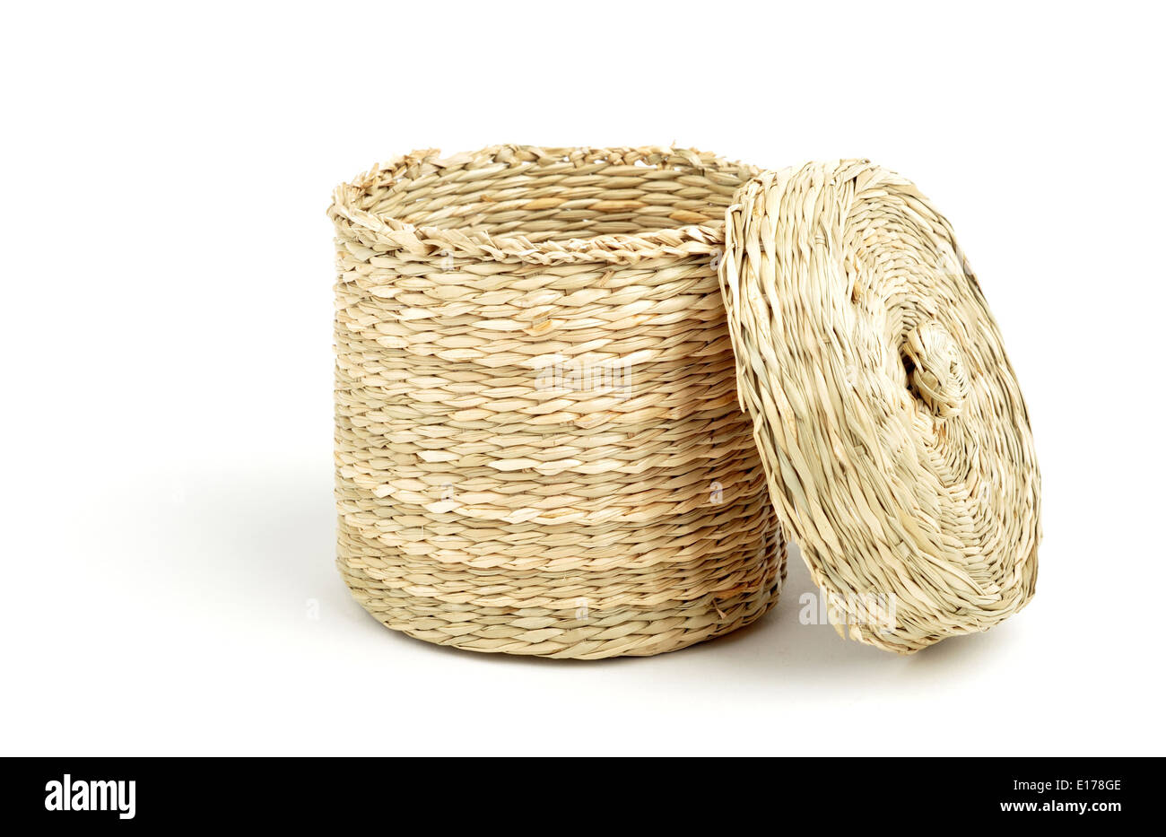 straw cylinder box with cap isolated over white background Stock Photo