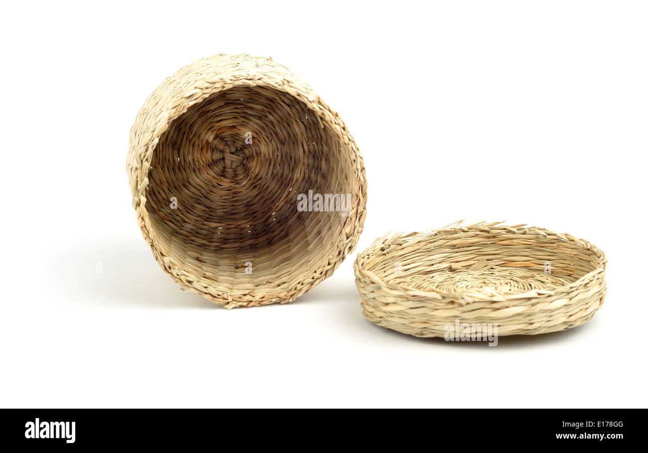 laying straw cylinder box with cap isolated over white background Stock Photo