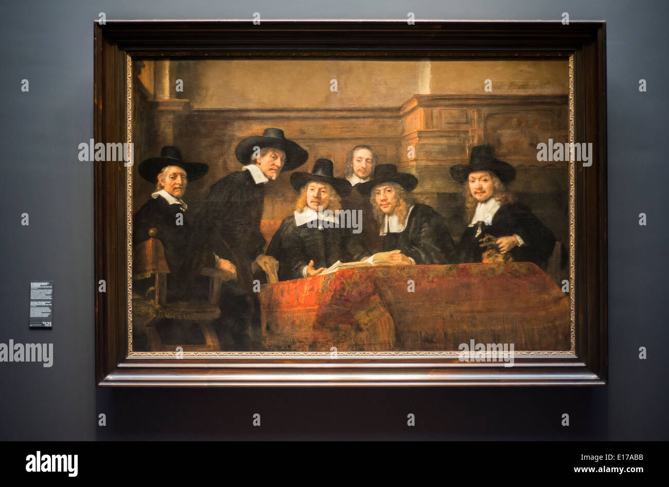 Rembrandt's The Syndics, also called The Wardens of the Amsterdam Drapers' Guild, hanging in Amsterdam's Rijksmuseum, Holland. Stock Photo