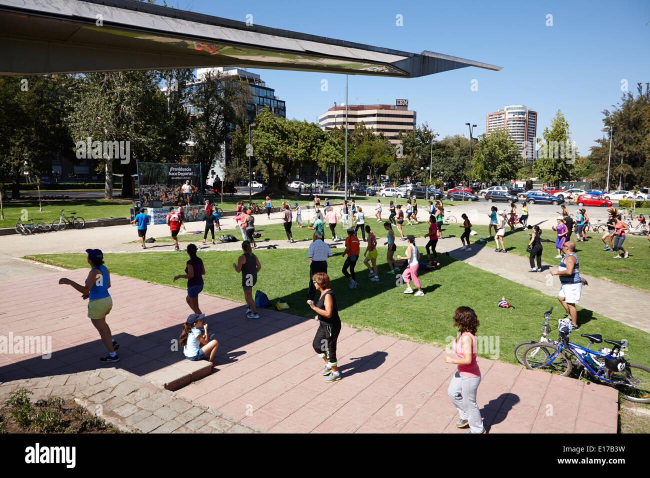 people taking part in sunday morning exercise class aviation park providencia Santiago Chile Stock Photo