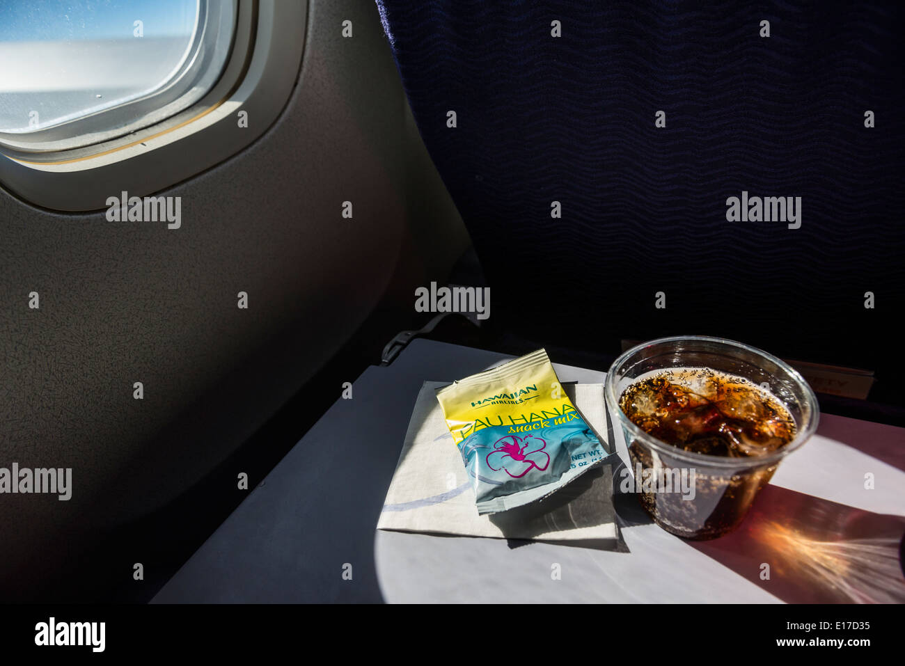 The snacks and refreshments offered during a flight on Hawaiian Airlines to Maui. Stock Photo