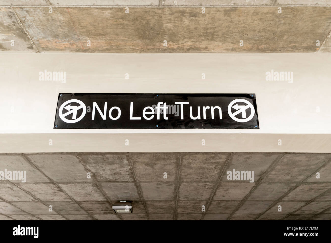 A directional sign at the entrance of a parking garage in Oklahoma City, Oklahoma, USA  saying No Left Turn. Stock Photo
