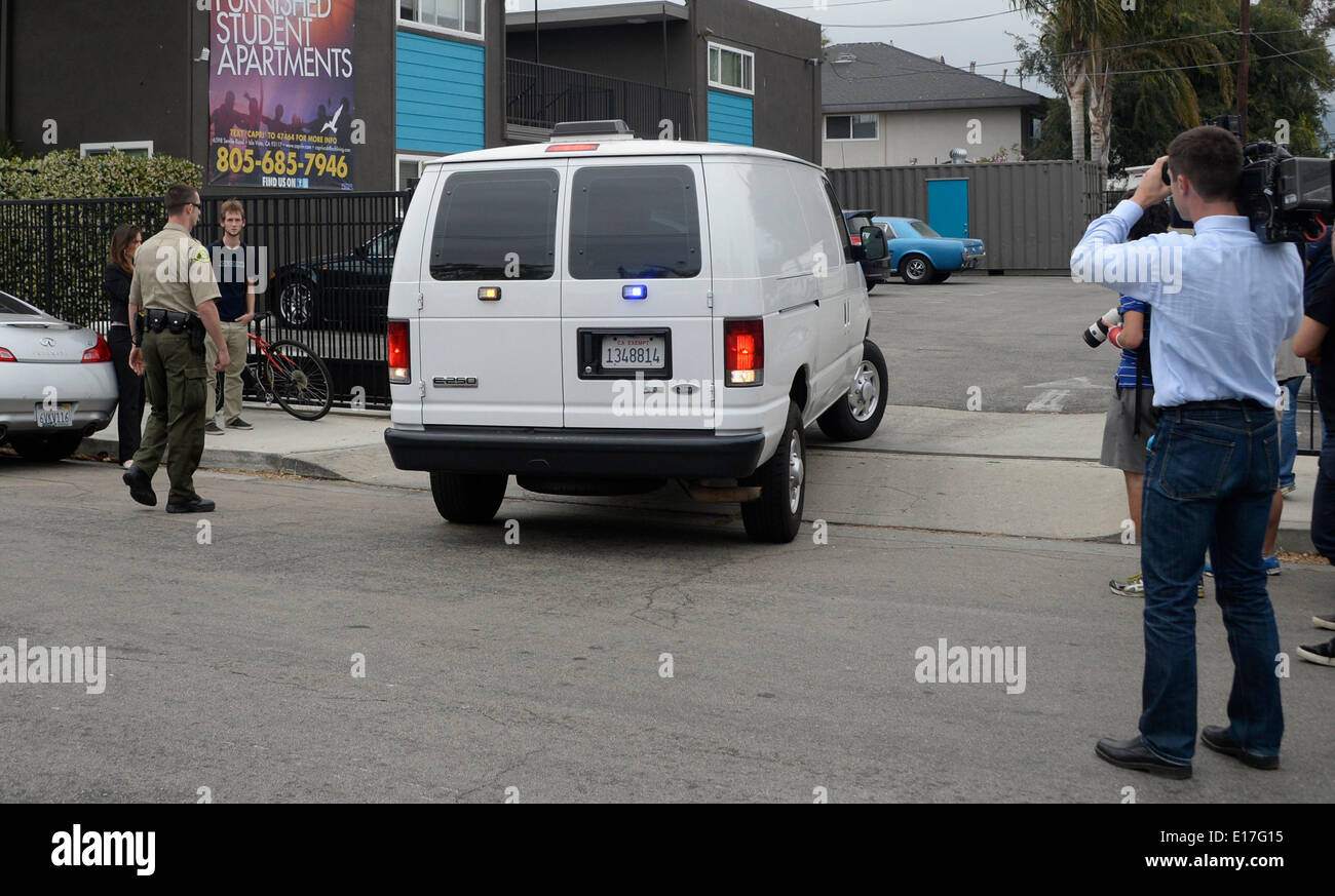 May 24, 2014. Isla Vista California-USA. Investigators leave in vans with the bodies from the killer's apartment complex were he stabbed them to death Saturday. The room mates have been ID as George Chen, 19, of San Jose, Weihan Wang, 20 and Cheng Yuan Hong, 20, of San Jose. Friday night a lone gunman sprayed bullets from a car in a drive-by shooting in a southern California college town, killing at least six people before his car crashed and he was found dead inside, authorities said on Saturday.Photo by Gene Blevins/LA Daily NewsZumaPress. (Credit Image: © Gene Blevins/ZUMAPRESS.com) Stock Photo