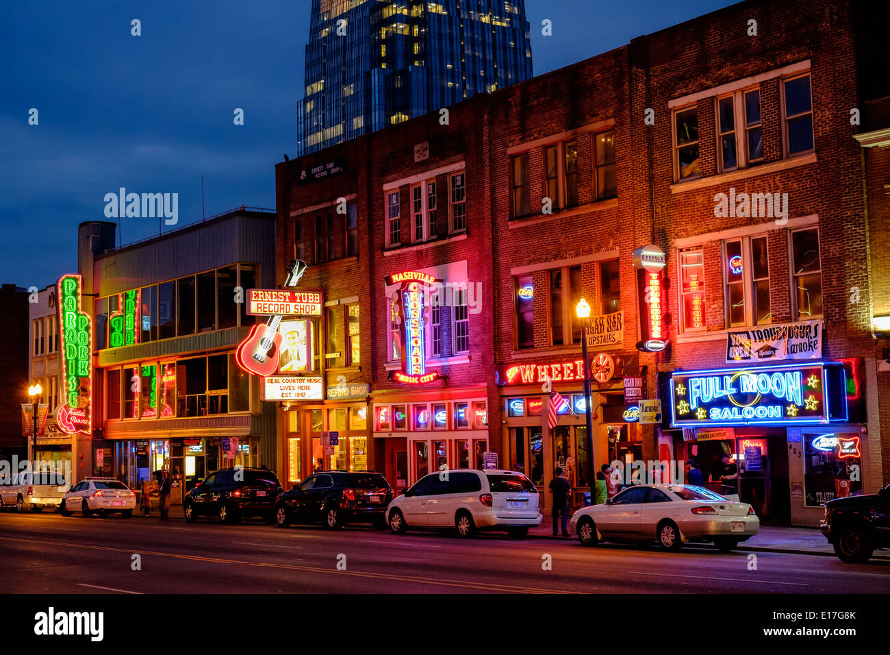 Neon signs illuminate Broadway Street in Downtown ...