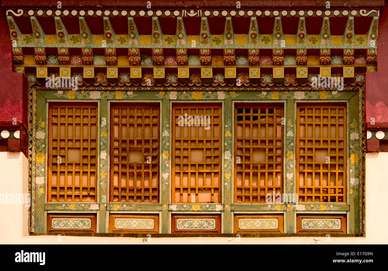 Art in Buddhist Monastery architecture in Sikkim, India - hand crafted and painted windows Stock Photo