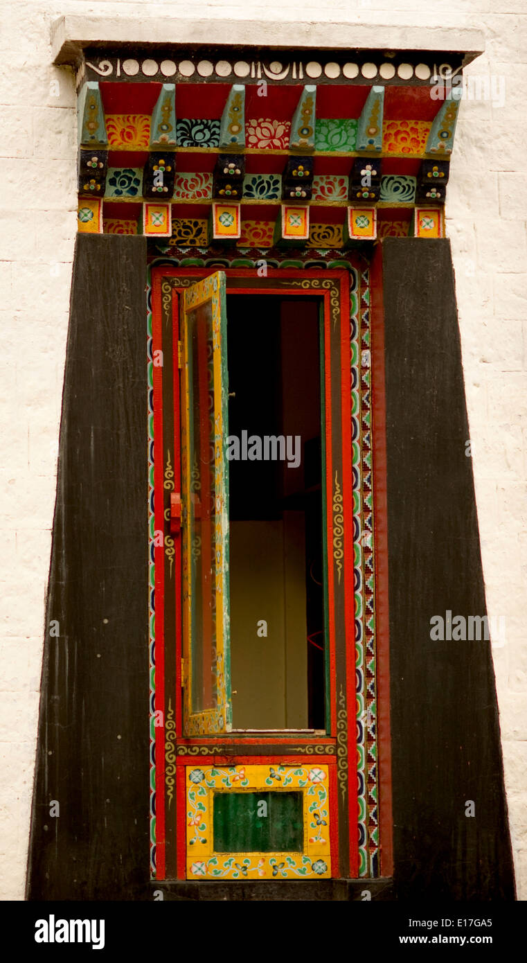 Art in Buddhist Monastery architecture in Sikkim, India - hand crafted and painted windows Stock Photo