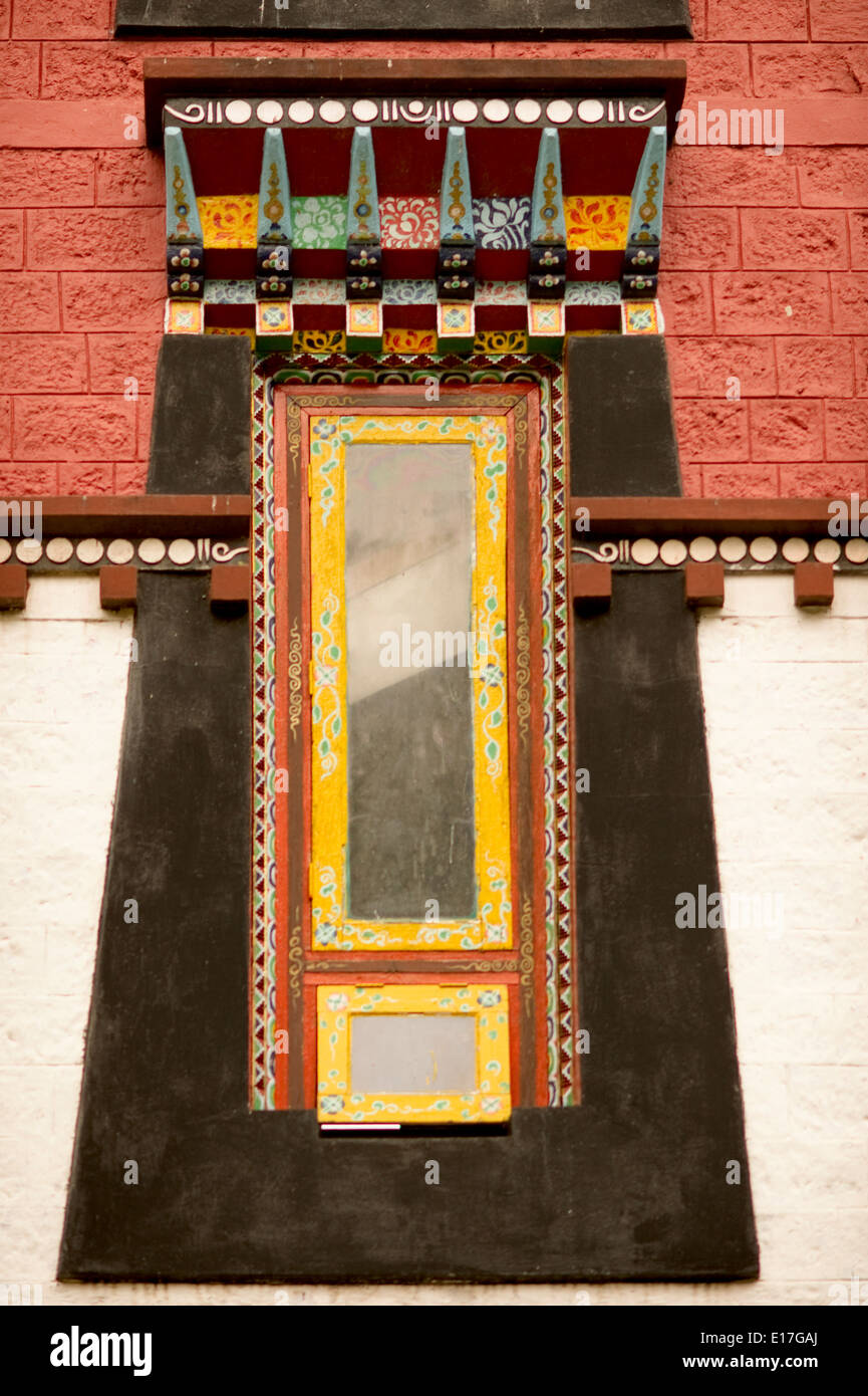 Art in Buddhist Monastery architecture in Sikkim, India - hand crafted and painted windows Stock Photo