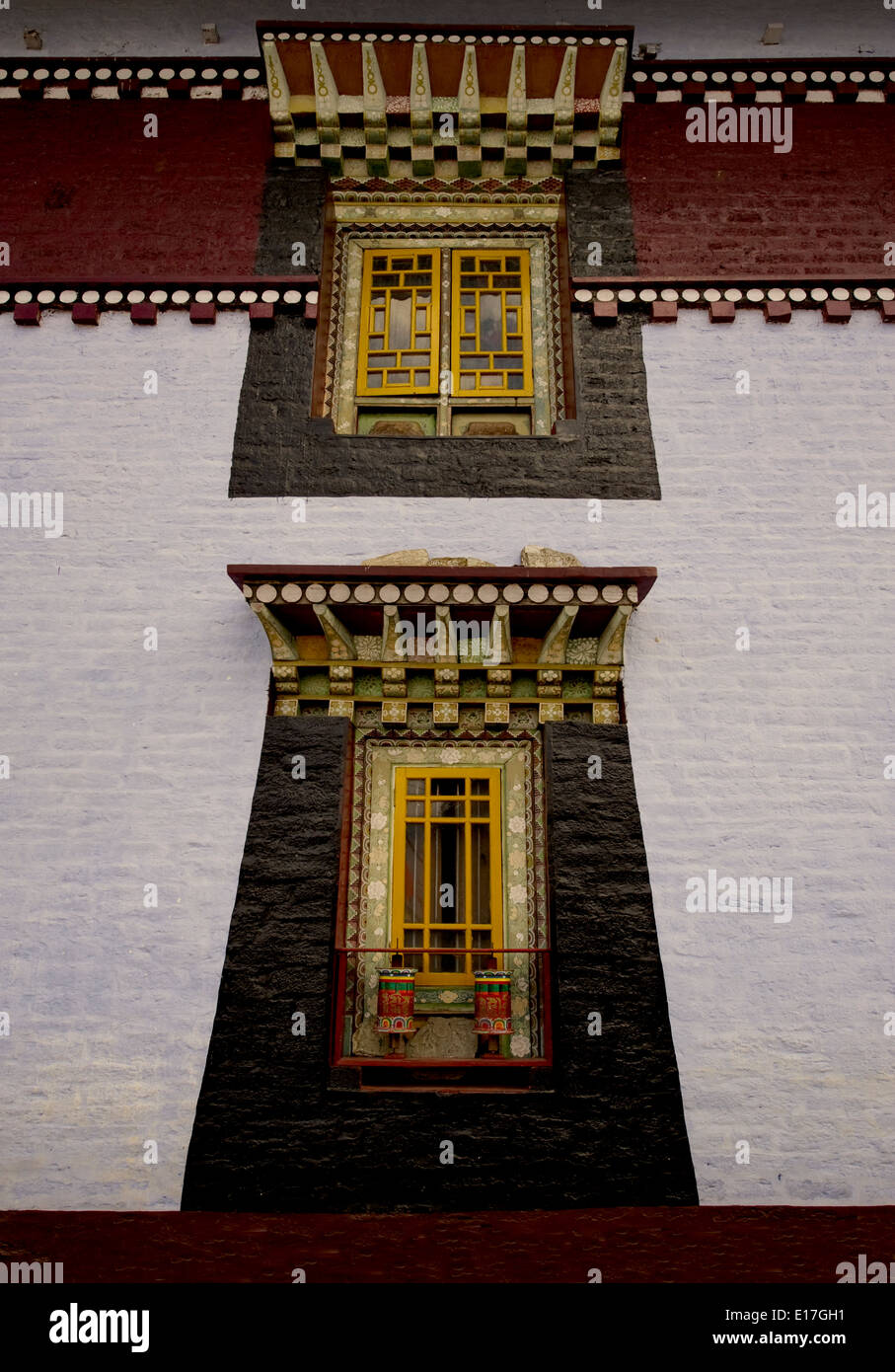 Art in Buddhist Monastery architecture in Sikkim, India - hand crafted and painted windows Stock Photo