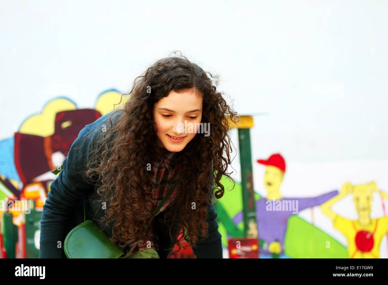 Portrait of beautiful young girl on the playground Stock Photo - Alamy