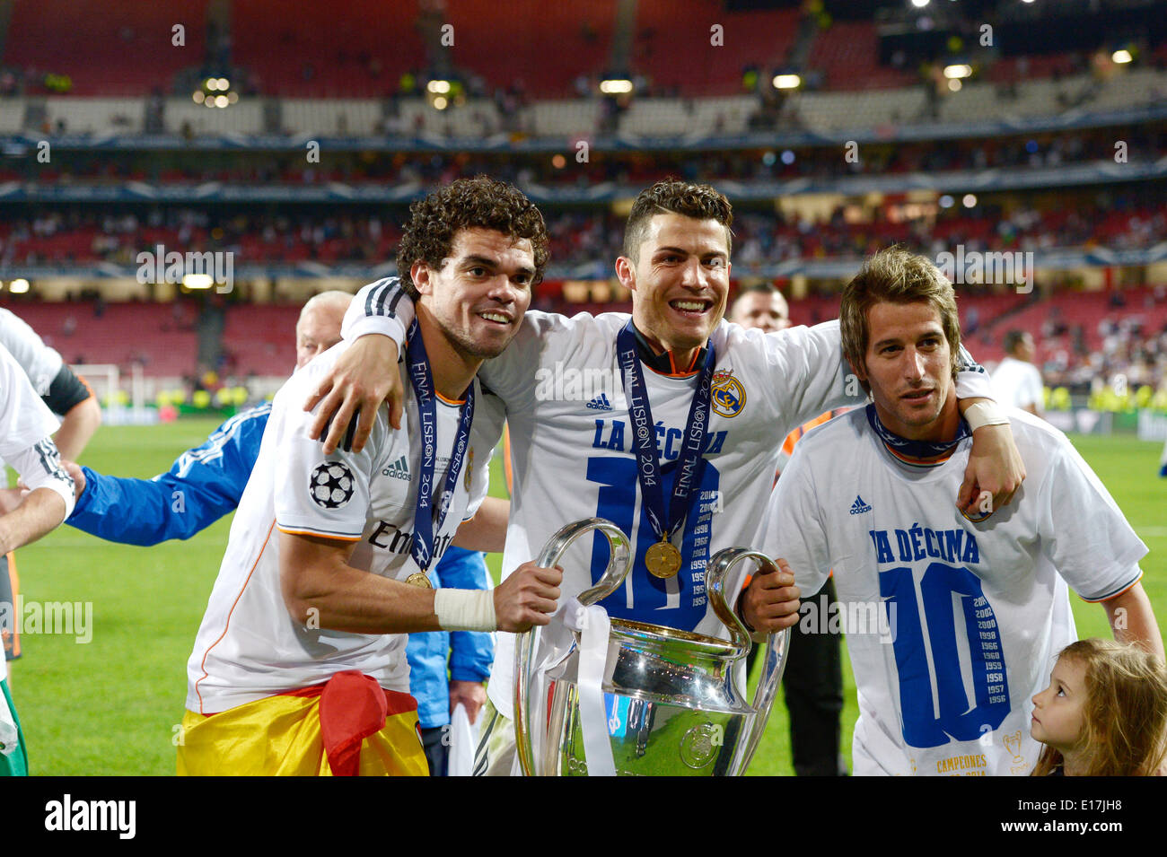 Lisbon, Portugal. 24th May, 2014. (L-R) Pepe, Cristiano Ronaldo, Fabio Coentrao (Real) Football/Soccer : Pepe, Cristiano Ronaldo and Fabio Coentrao of Real Madrid celebrate with the trophy after winning the UEFA Champions League Final match between Real Madrid 4-1 Atletico de Madrid at Estadio da Luz in Lisbon, Portugal . © FAR EAST PRESS/AFLO/Alamy Live News Stock Photo